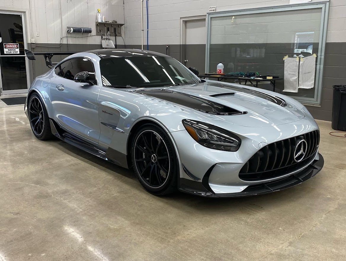 Silver Mercedes AMG GT in the tint bay