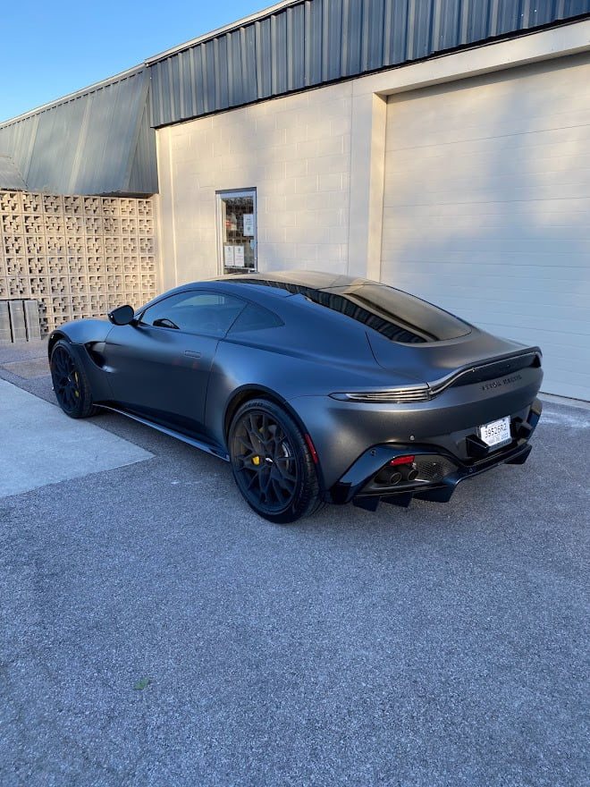 Matte Aston Martin outside the shop